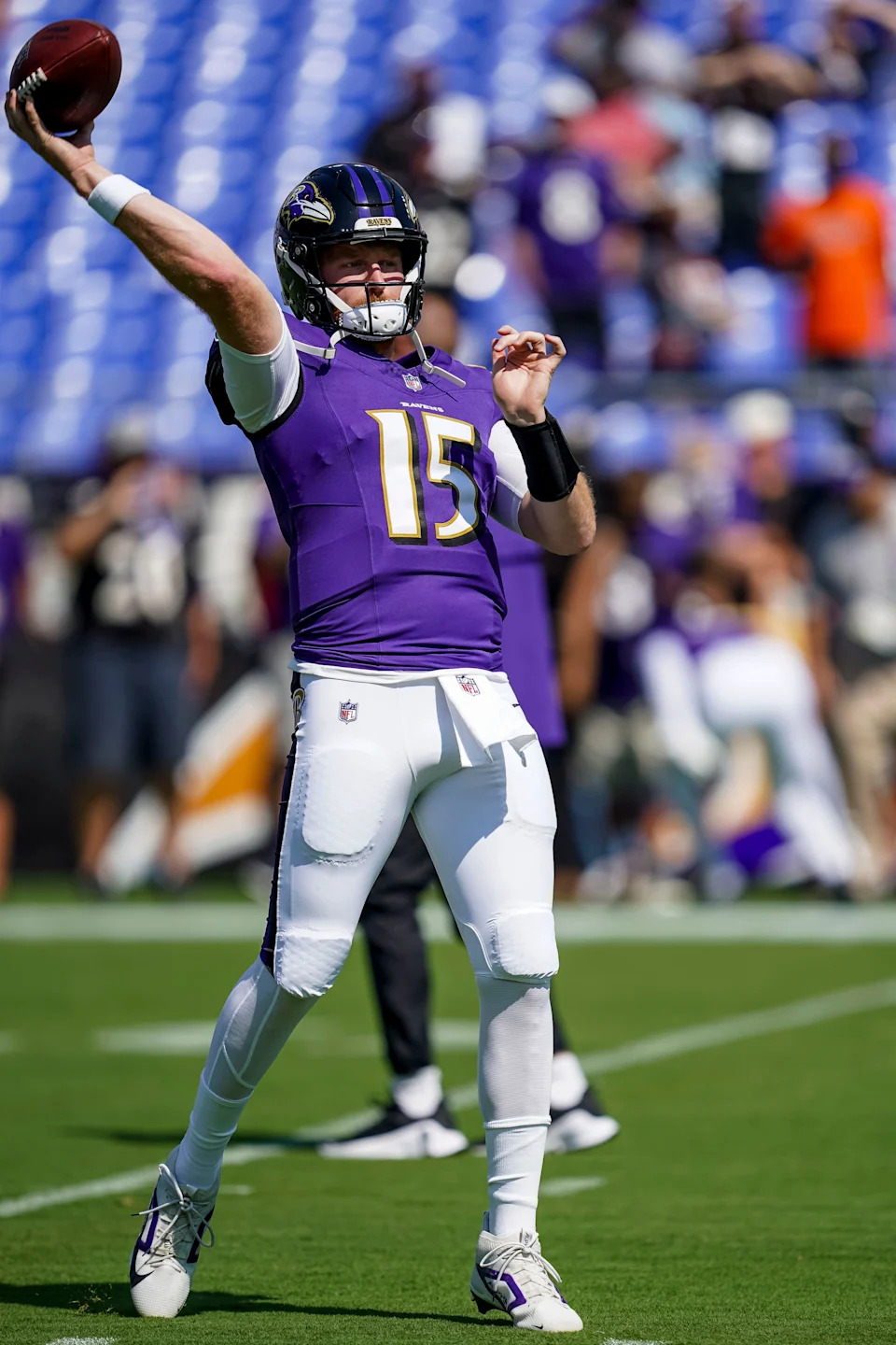 Sep 14, 2025; Baltimore, Maryland, USA; Baltimore Ravens quarterback Cooper Rush (15) warms up before the game against the Cleveland Browns at M&T Bank Stadium. Mandatory Credit: Mitch Stringer-Imagn Images