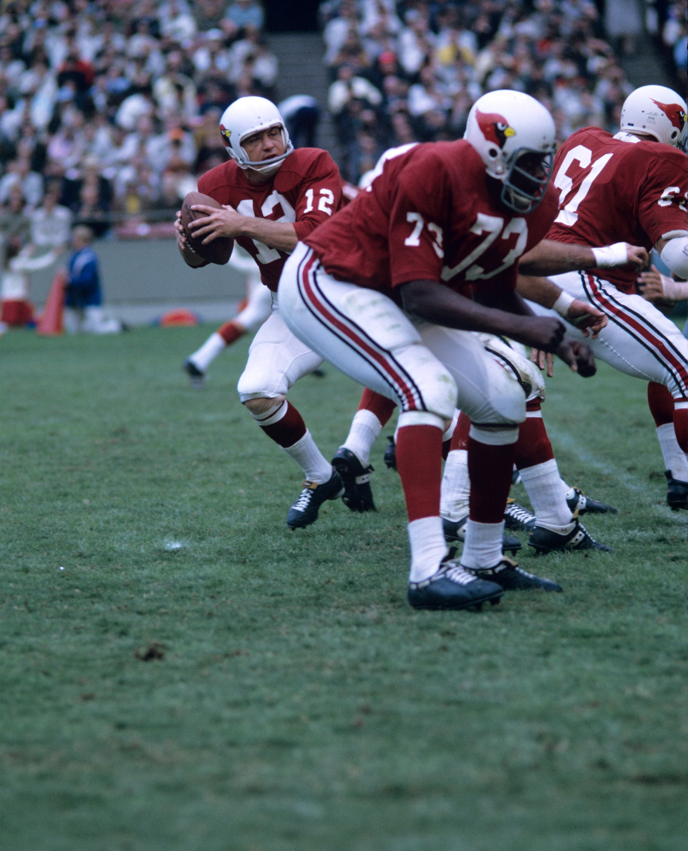 ST. LOUIS, MO - OCTOBER 6, 1968: Quarterback Charlie Johnson #12 of the St. Louis Cardinals drops back to pass as tackle Ernie McMillan #73 sets up to block during a game on October 6, 1968 against the Dallas Cowboys at Busch Stadium in St. Louis, Missouri. (Photo by: Diamond Images/Getty Images)