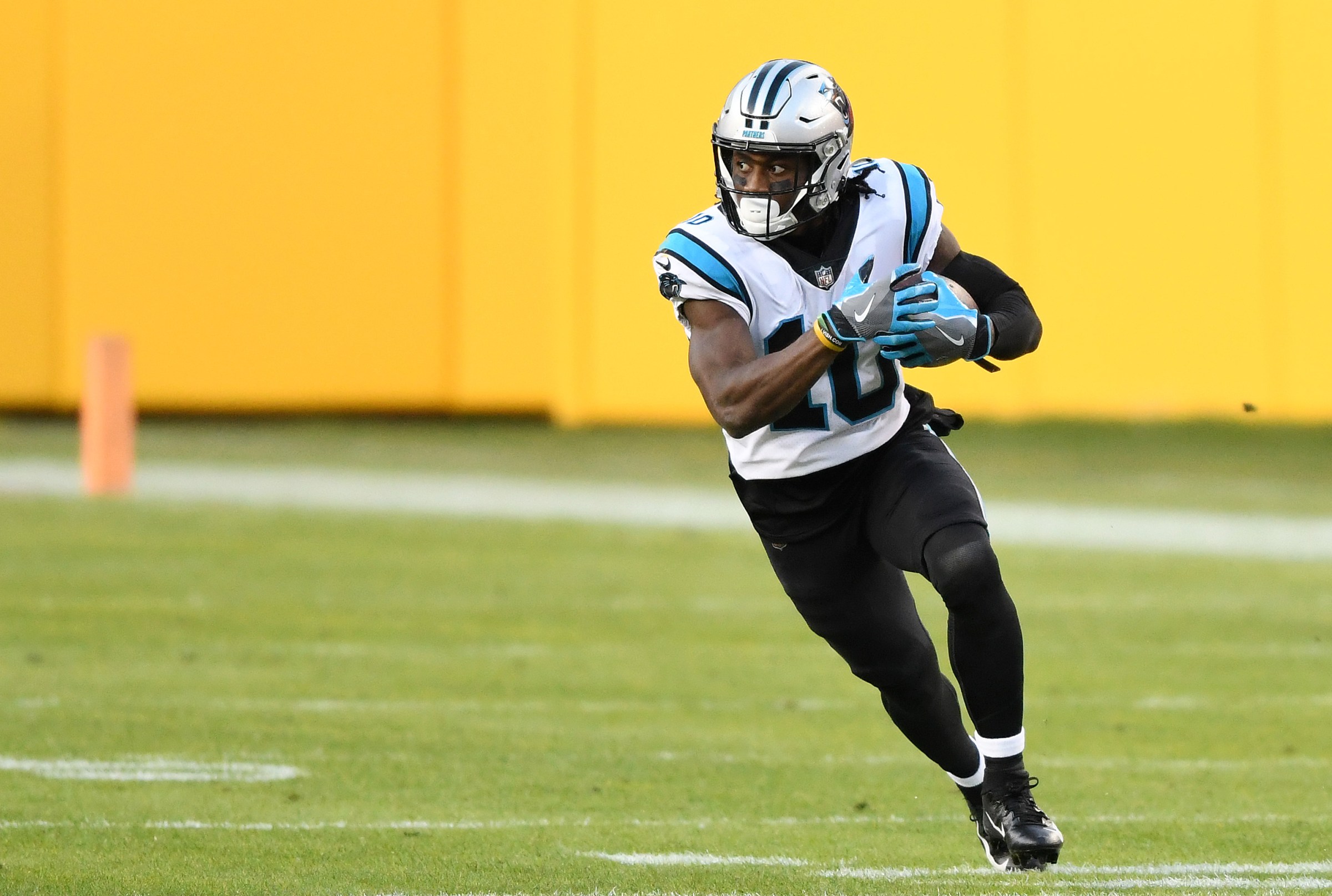 LANDOVER, MARYLAND - DECEMBER 27: Curtis Samuel #10 of the Carolina Panthers runs with the ball after a reception against the Washington Football Team during the second quarter at FedExField on December 27, 2020 in Landover, Maryland. (Photo by Mitchell Layton/Getty Images)