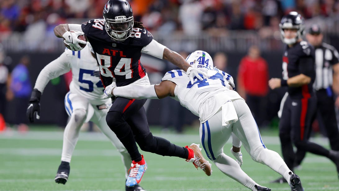 ATLANTA, GEORGIA - DECEMBER 24: Cordarrelle Patterson #84 of the Atlanta Falcons is tackled by Zaire Franklin #44 of the Indianapolis Colts during the fourth quarter at Mercedes-Benz Stadium on December 24, 2023 in Atlanta, Georgia.