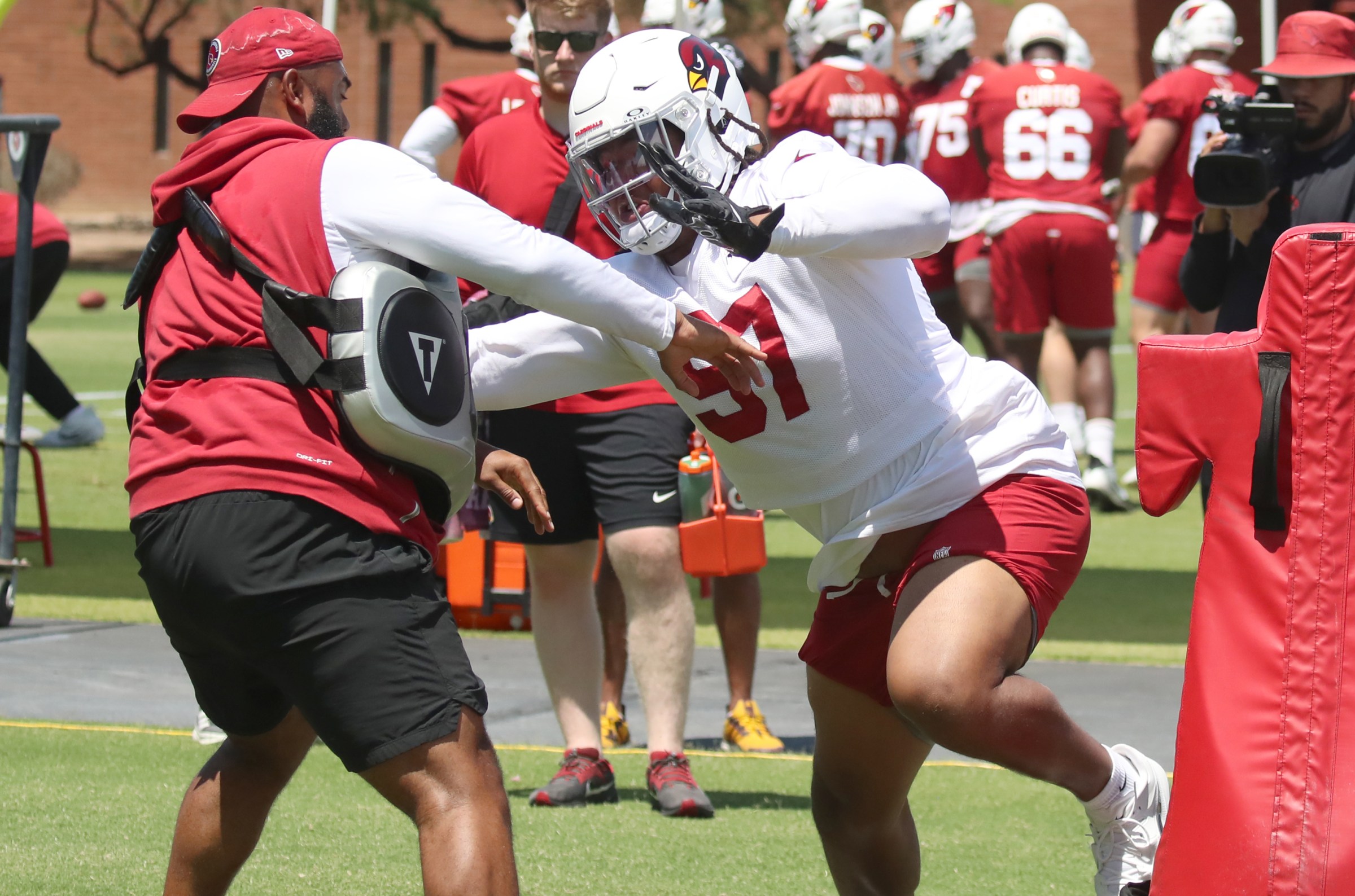 TEMPE, ARIZONA - JUNE 3: Defensive lineman Walter Nolen III #97 of the Arizona Cardinals runs a defensive drill during the AZ Cardinals OTAs at Dignity Health Arizona Cardinals Training Center on June 3, 2025 in Tempe, Arizona. (Photo by Bruce Yeung/Getty Images)