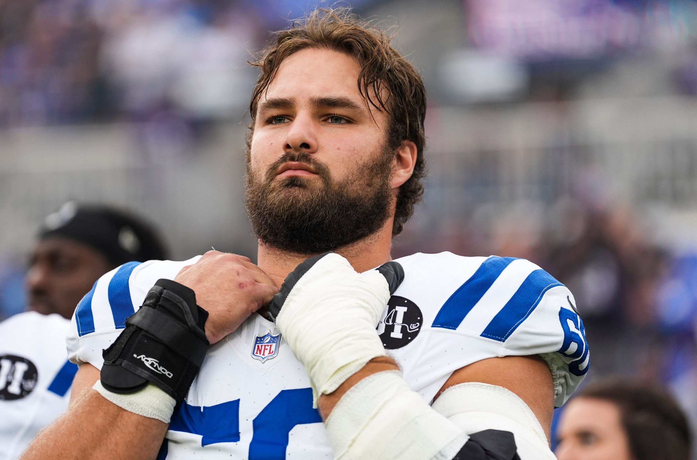 BALTIMORE, MD - AUGUST 07: Tanor Bortolini #60 of the Indianapolis Colts looks on from the sideline prior to an NFL preseason football game against the Baltimore Ravens at M&T Bank Stadium on August 07, 2025 in Baltimore, Maryland. (Photo by Perry Knotts/Getty Images)