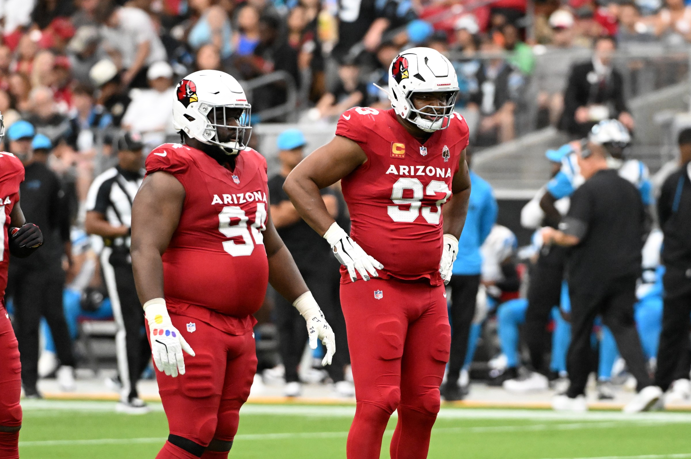GLENDALE, ARIZONA - SEPTEMBER 14: Calais Campbell #93 and Dalvin Tomlinson #94 of the Arizona Cardinals looks across the line of scrimmage against the Carolina Panthers during the NFL 2025 game at State Farm Stadium on September 14, 2025 in Glendale, Arizona. (Photo by Norm Hall/Getty Images)