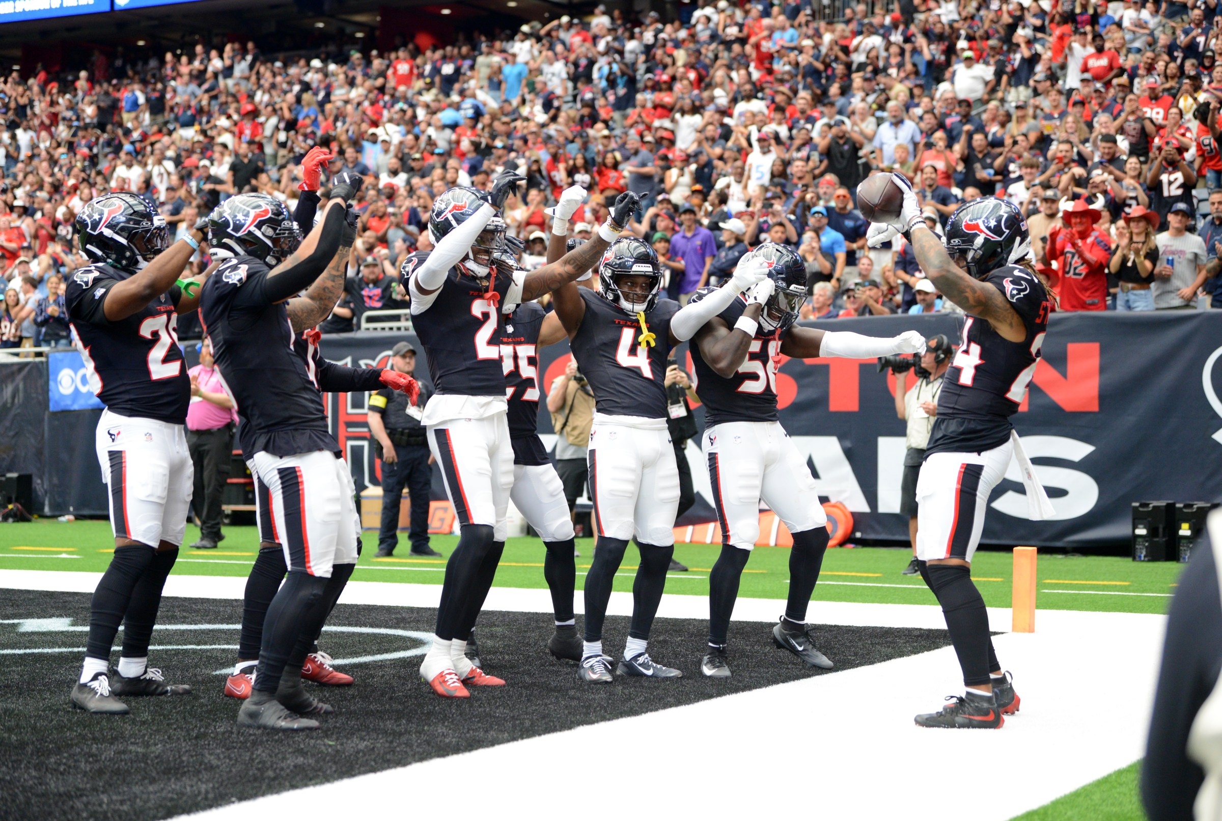 HOUSTON, TX - SEPTEMBER 28: Houston Texans defenders celebrate with Derek Stingley Jr. (24) after an interception during game featuring the Tennessee Titans and the Houston Texans on September 28, 2025 at NRG Stadium in Houston, TX. (Photo by John Rivera/Icon Sportswire via Getty Images)