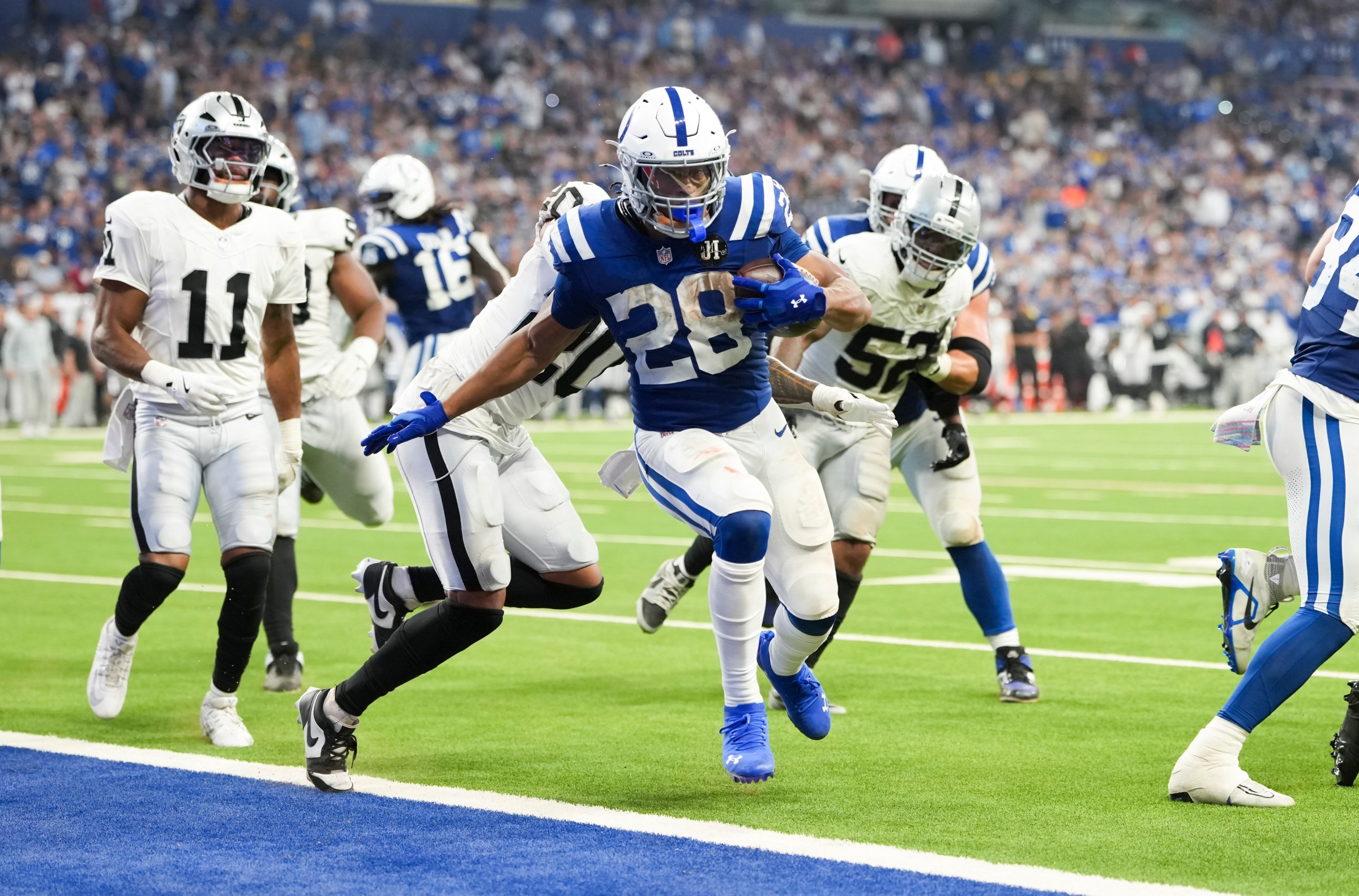 INDIANAPOLIS, INDIANA - OCTOBER 5: Jonathan Taylor #28 of the Indianapolis Colts runs into the end zone during an NFL football game against the Las Vegas Raiders at Lucas Oil Stadium on October 5, 2025 in Indianapolis, Indiana. (Photo by Todd Rosenberg/Getty Images)