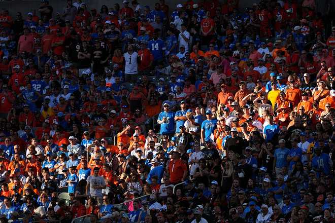 CINCINNATI, OHIO - OCTOBER 05: Detroit Lions and Cincinnati Bengals fans cheer during the second quarter at Paycor Stadium on October 05, 2025 in Cincinnati, Ohio. (Photo by Dylan Buell/Getty Images)