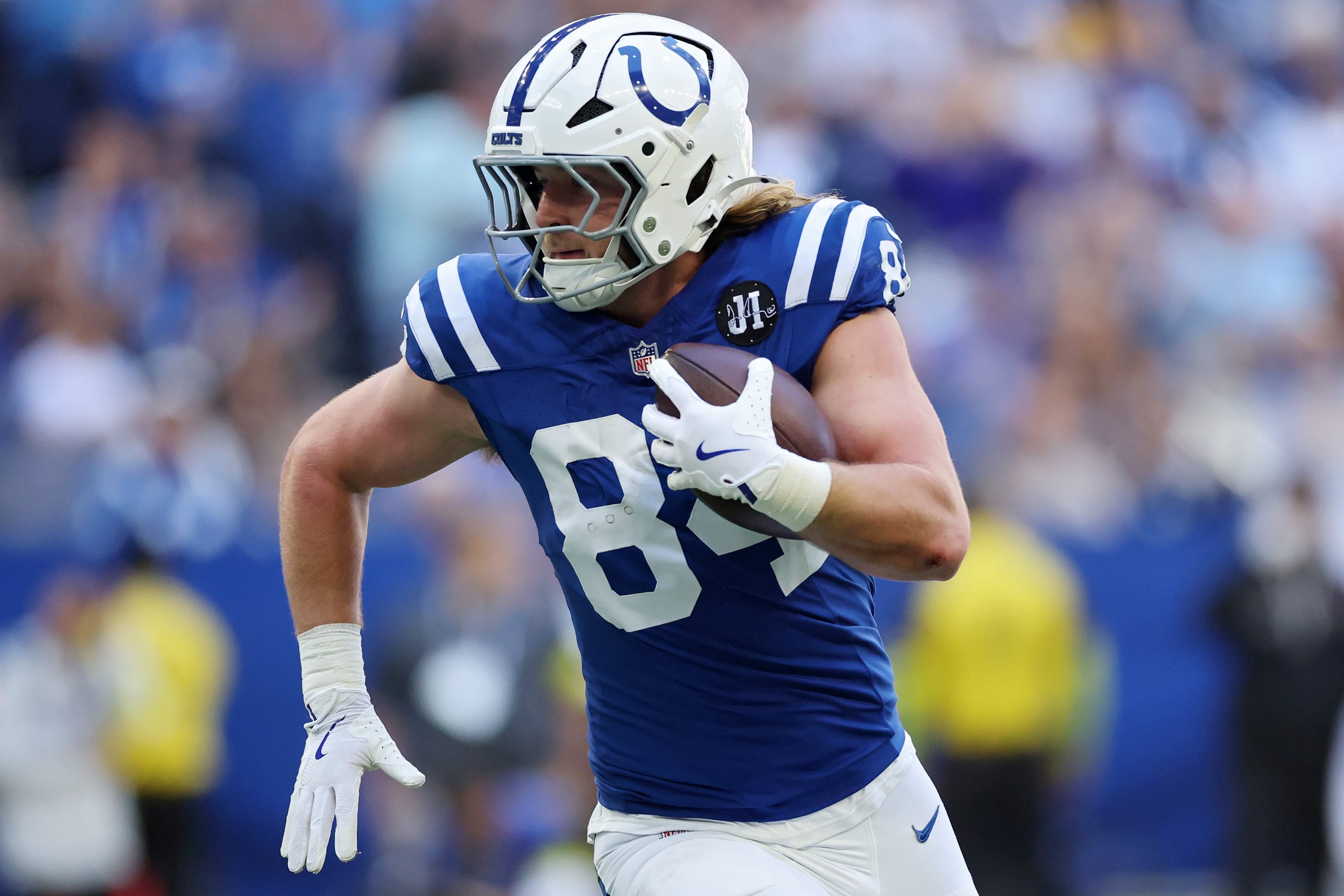 INDIANAPOLIS, INDIANA - OCTOBER 12: Tyler Warren #84 of the Indianapolis Colts runs for a touchdown against the Arizona Cardinals during the first quarter in the game at Lucas Oil Stadium on October 12, 2025 in Indianapolis, Indiana. (Photo by Andy Lyons/Getty Images)