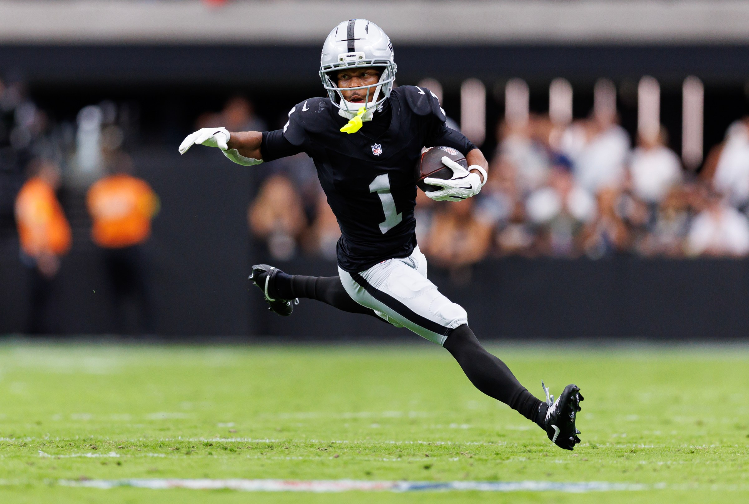 LAS VEGAS, NEVADA - OCTOBER 12: Tre Tucker #1 of the Las Vegas Raiders completes a catch during the first half of an NFL football game against the Tennessee Titans at Allegiant Stadium on October 12, 2025 in Las Vegas, Nevada. (Photo by Brooke Sutton/Getty Images)