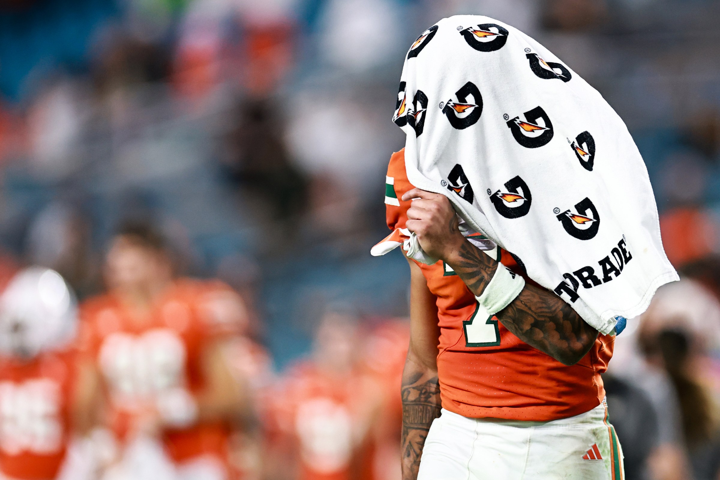 MIAMI GARDENS, FLORIDA - OCTOBER 17: CJ Daniels #7 of the Miami Hurricanes walks off the field following a loss to the Louisville Cardinals at Hard Rock Stadium on October 17, 2025 in Miami Gardens, Florida. (Photo by Carmen Mandato/Getty Images)