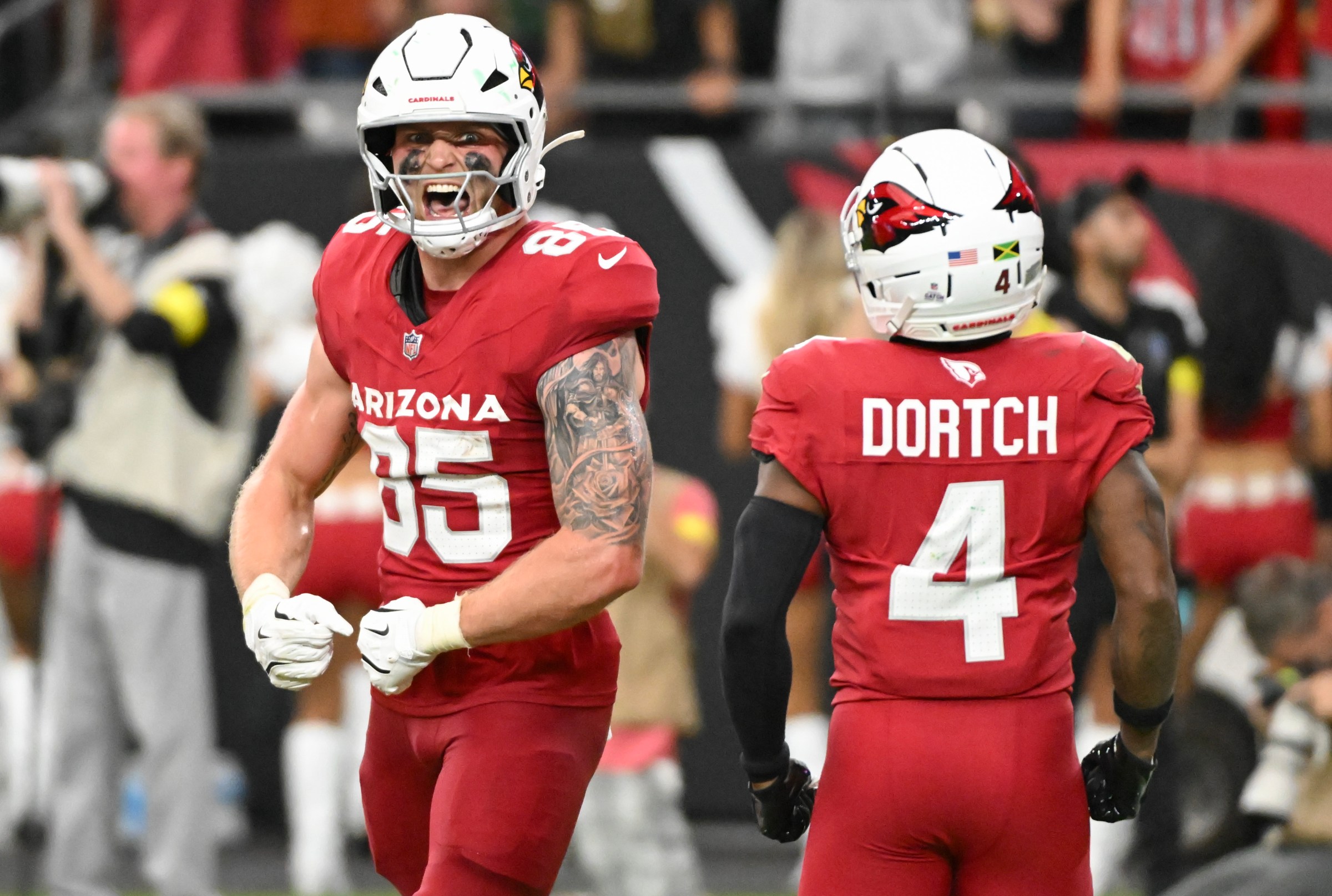 GLENDALE, ARIZONA - OCTOBER 19: Trey McBride #85 of the Arizona Cardinals celebrates after his receiving touchdown in the third quarter of a game against the Green Bay Packers at State Farm Stadium on October 19, 2025 in Glendale, Arizona. (Photo by Norm Hall/Getty Images)