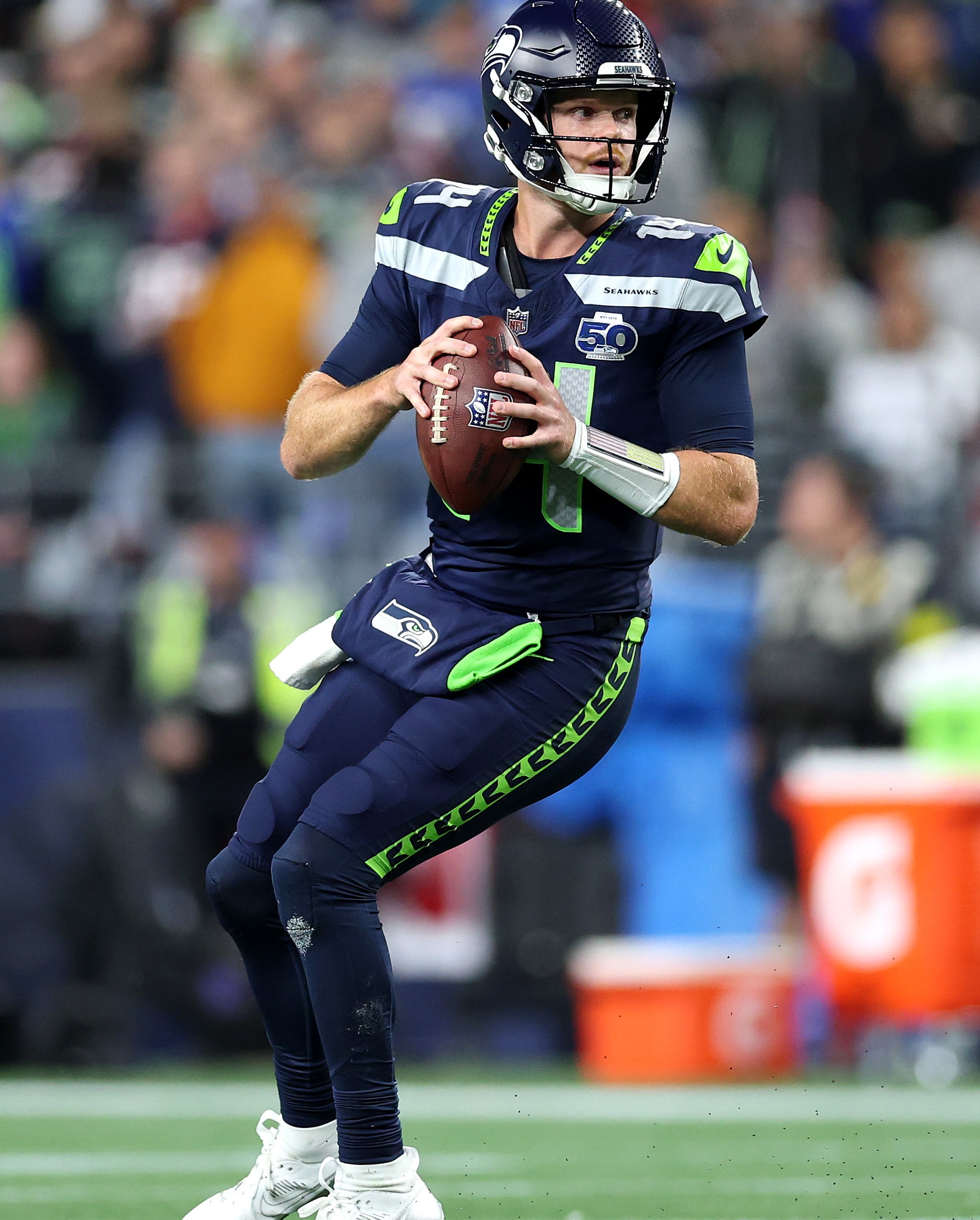 SEATTLE, WASHINGTON - OCTOBER 20: Sam Darnold #14 of the Seattle Seahawks looks to pass against the Houston Texans during the first quarter at Lumen Field on October 20, 2025 in Seattle, Washington. (Photo by Steph Chambers/Getty Images)