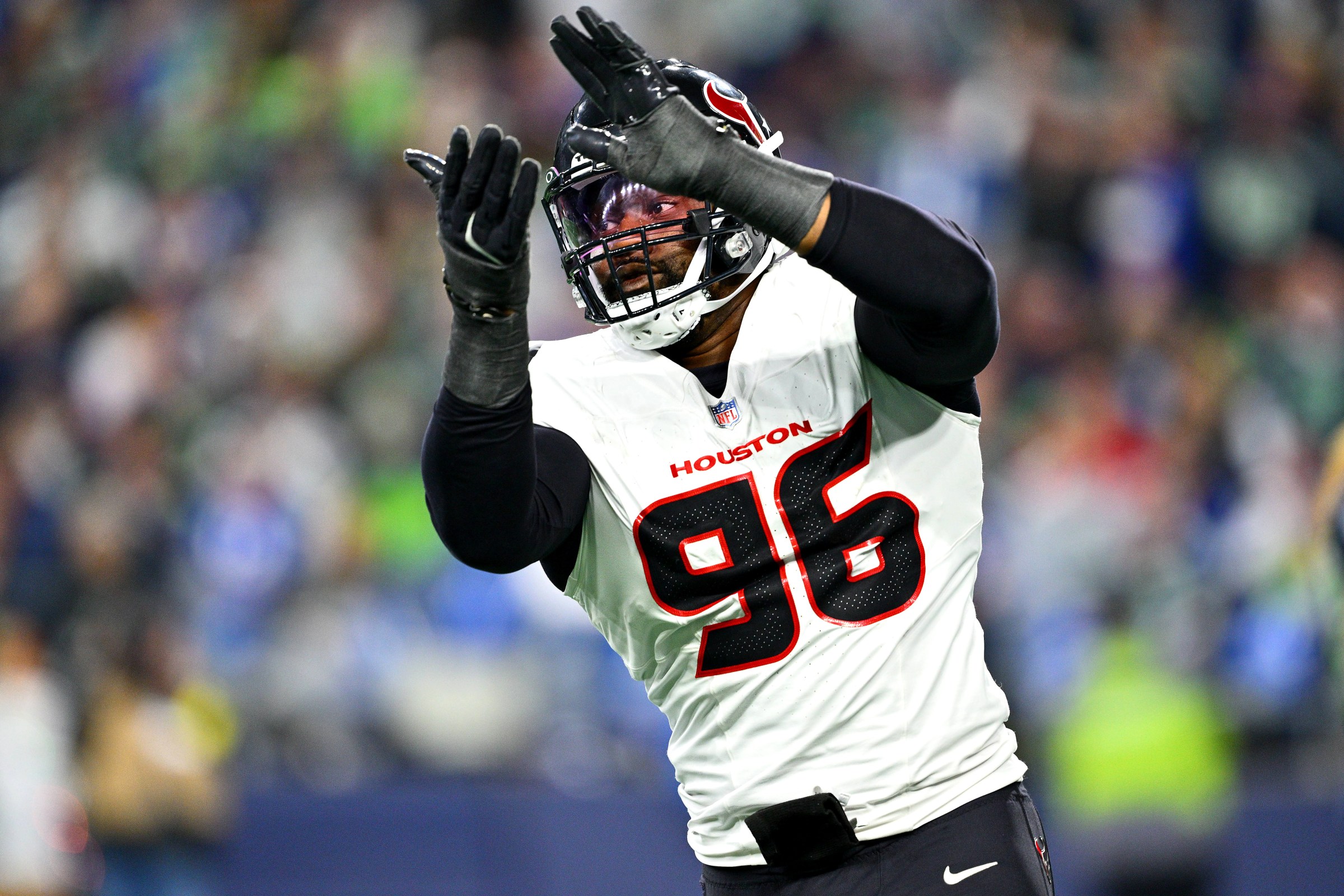 SEATTLE, WASHINGTON - OCTOBER 20: Denico Autry #96 of the Houston Texans reacts against the Seattle Seahawks during the second quarter at Lumen Field on October 20, 2025 in Seattle, Washington. (Photo by Jane Gershovich/Getty Images)