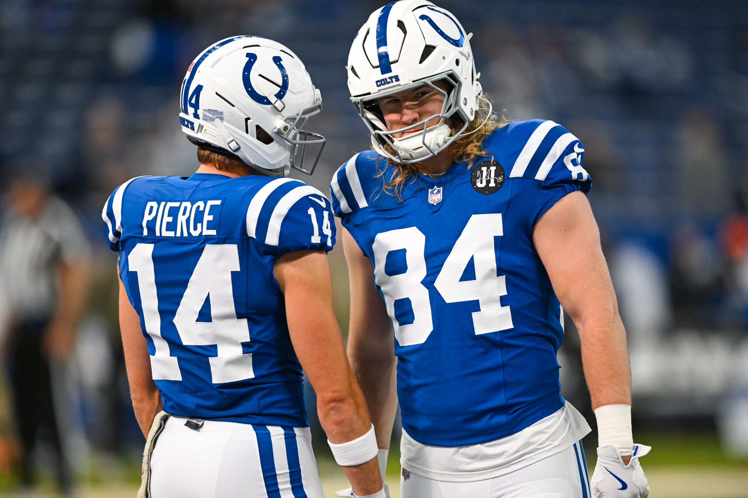 INDIANAPOLIS, IN - OCTOBER 26: Indianapolis Colts Tight End Tyler Warren (84) and Indianapolis Colts Wide Receiver Alec Pierce (14) warm up before the NFL game between the Tennessee Titans and the Indianapolis Colts on October 26, 2025, at Lucas Oil Stadium in Indianapolis, Indiana. (Photo by Michael Allio/Icon Sportswire via Getty Images)