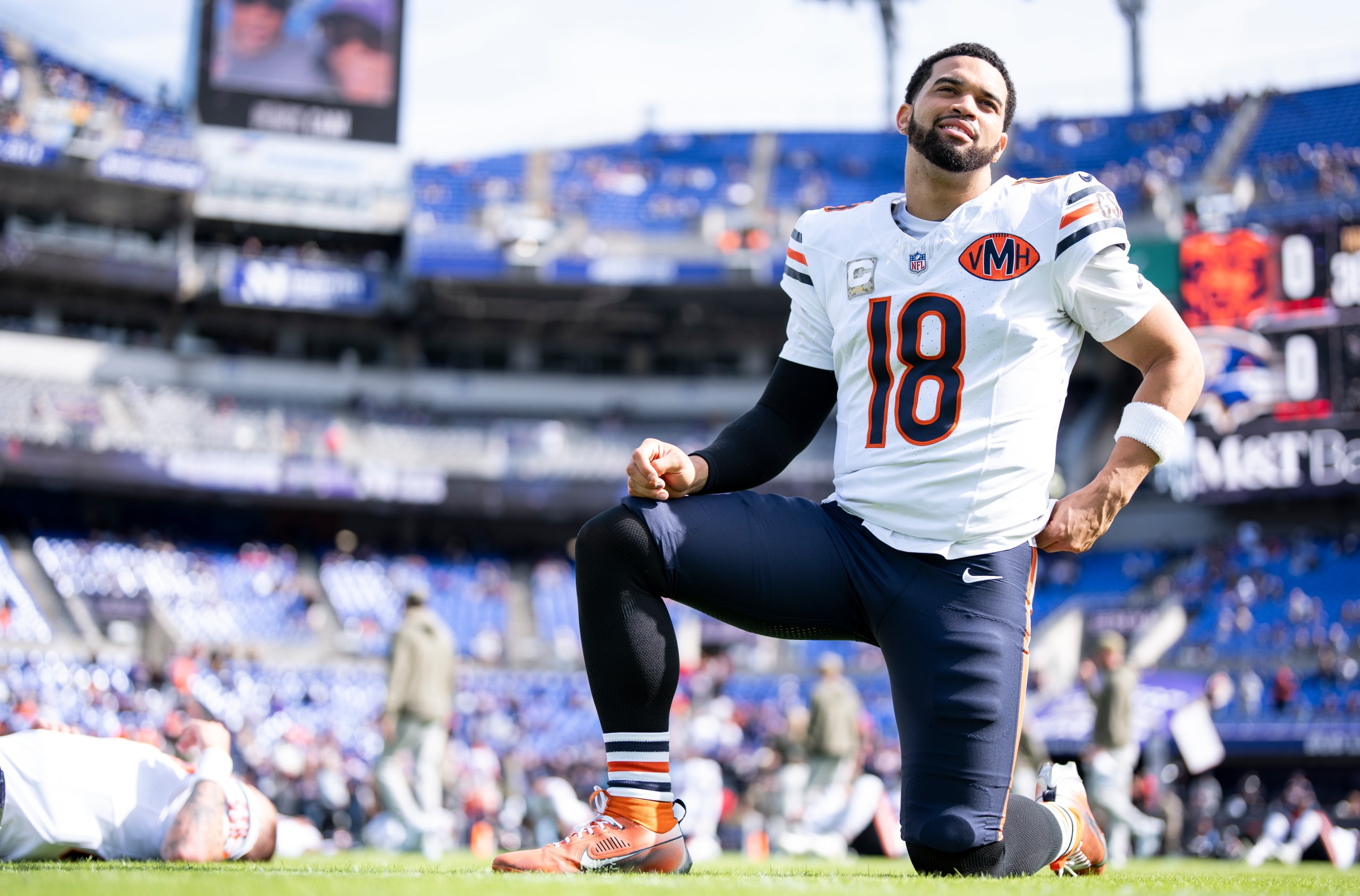 BALTIMORE, MARYLAND - OCTOBER 26: Caleb Williams #18 of the Chicago Bears looks on as he stretches prior to an NFL football game against the Baltimore Ravens at M&T Bank Stadium on October 26, 2025 in Baltimore, Maryland. (Photo by Michael Owens/Getty Images)