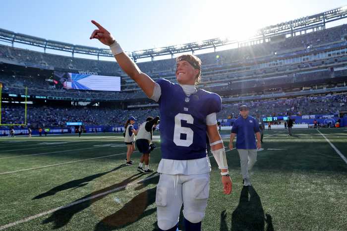 Giants quarterback Jaxson Dart pointing while celebrating win over Chargers