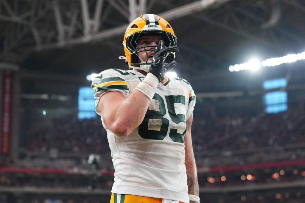 Green Bay Packers tight end Tucker Kraft (85) celebrating a touchdown.