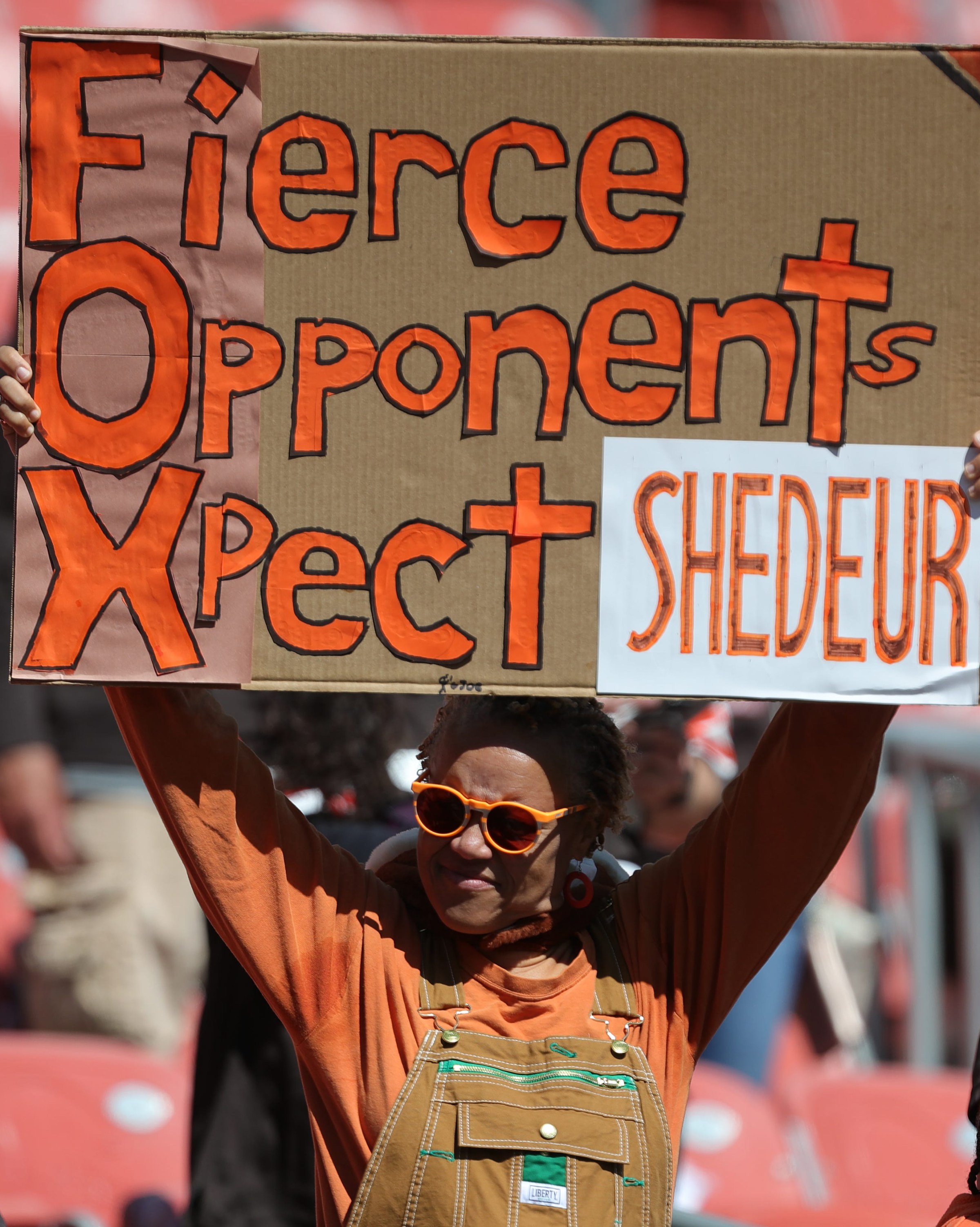 A Shedeur Sanders fan lets everyone know her quarterback preference before an NFL football game at Huntington Bank Field, Sept. 7, 2025, in Cleveland, Ohio.