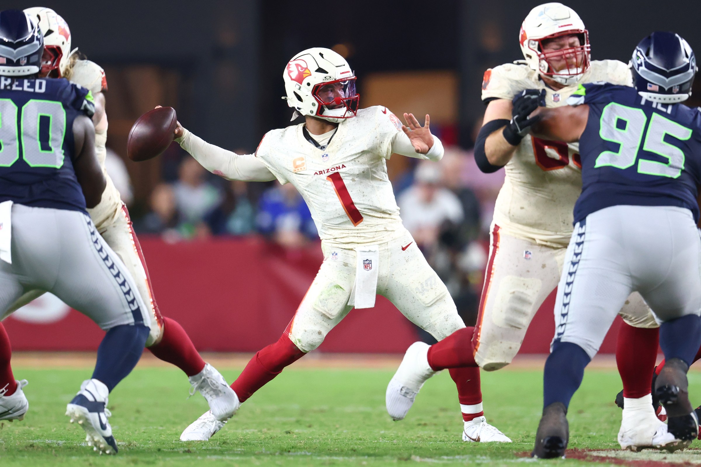 Sep 25, 2025; Glendale, Arizona, USA; Arizona Cardinals quarterback Kyler Murray (1) passes against the Seattle Seahawks in the third quarter at State Farm Stadium. Mandatory Credit: Mark J. Rebilas-Imagn Images