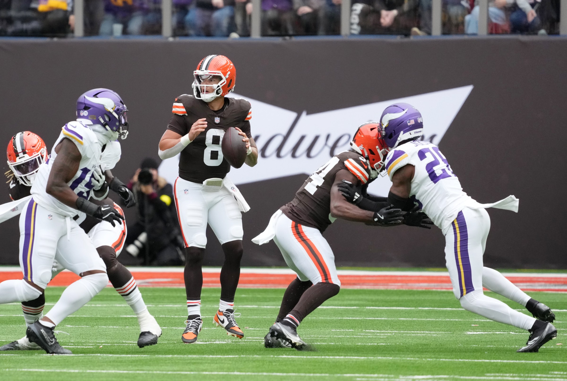 Oct 5, 2025; Tottenham, United Kingdom; Cleveland Browns quarterback Dillon Gabriel (8) looks to pass the ball against the Minnesota Vikings during the second quarter of an NFL International Series game at Tottenham Hotspur Stadium. Mandatory Credit: Kirby Lee-Imagn Images