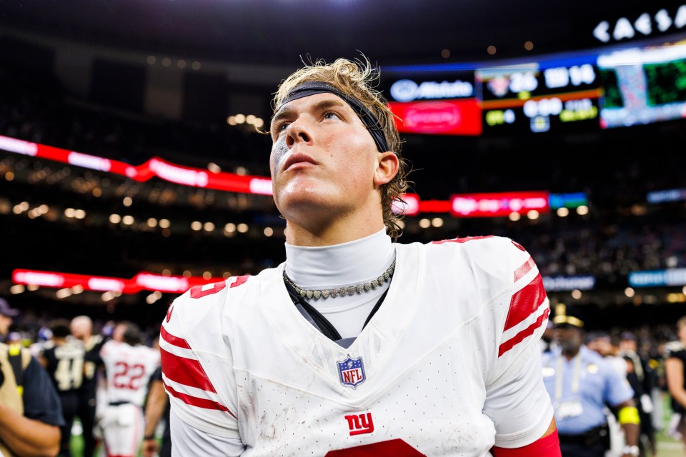 Jaxson Dart #6 of the New York Giants walks off the field after a game against the New Orleans Saints.