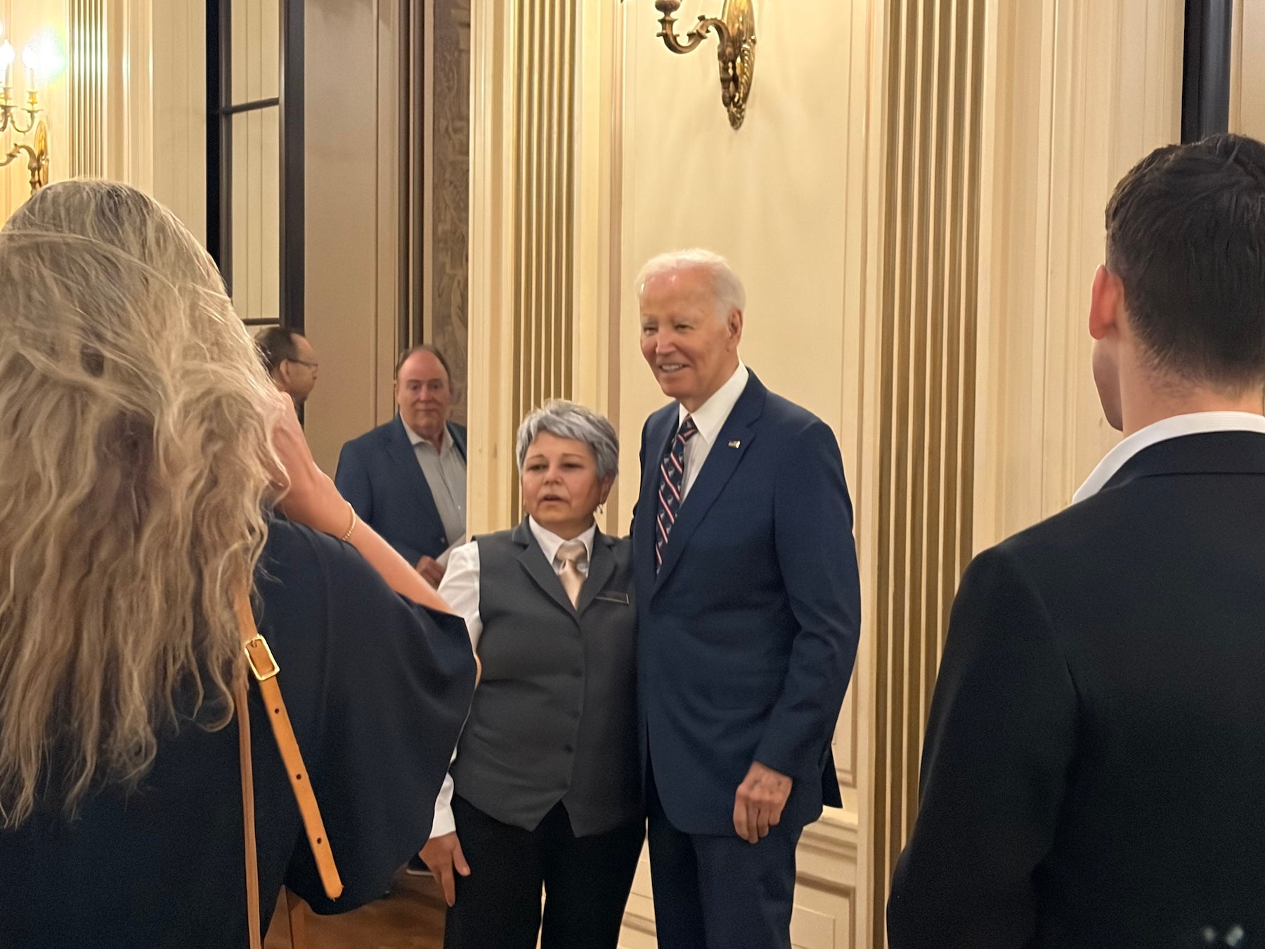 Attendees flocked around former President Biden