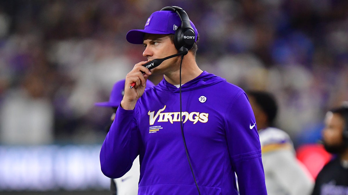 Kevin O'Connell looks on during a game