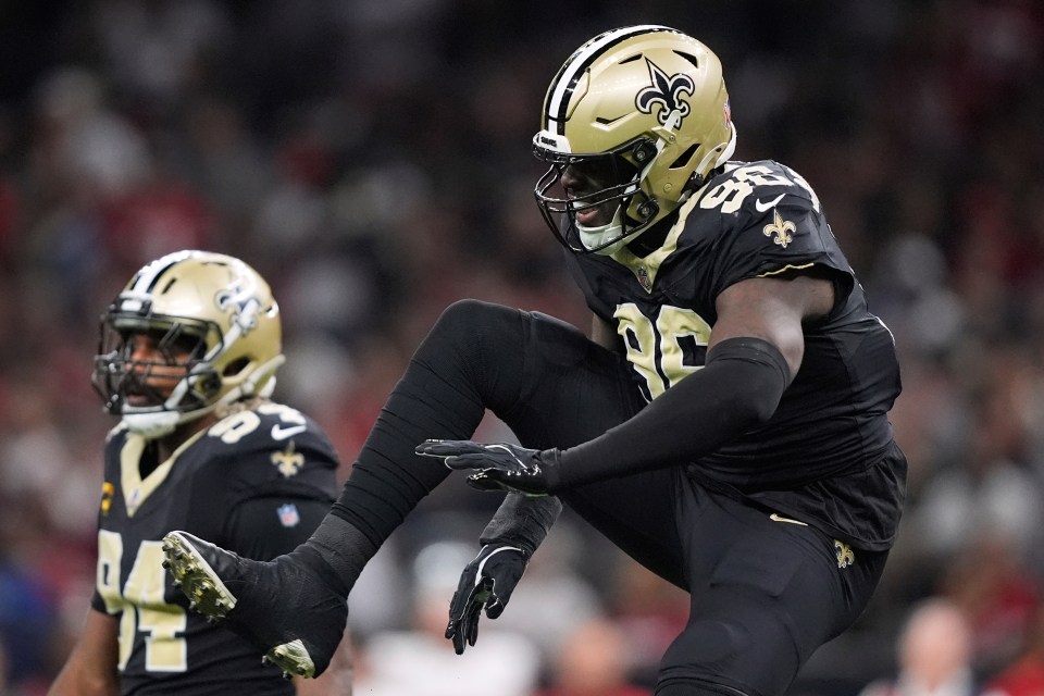 New Orleans Saints defensive end Carl Granderson celebrates sacking San Francisco 49ers quarterback Mac Jones.