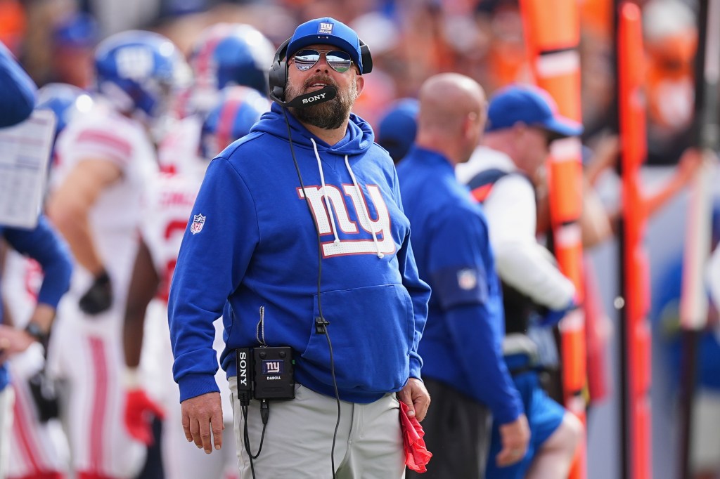 Giants head coach Brian Daboll watches from the sideline during the first half of an NFL football game against the Denver Broncos in Denver, Sunday, Oct. 19, 2025.