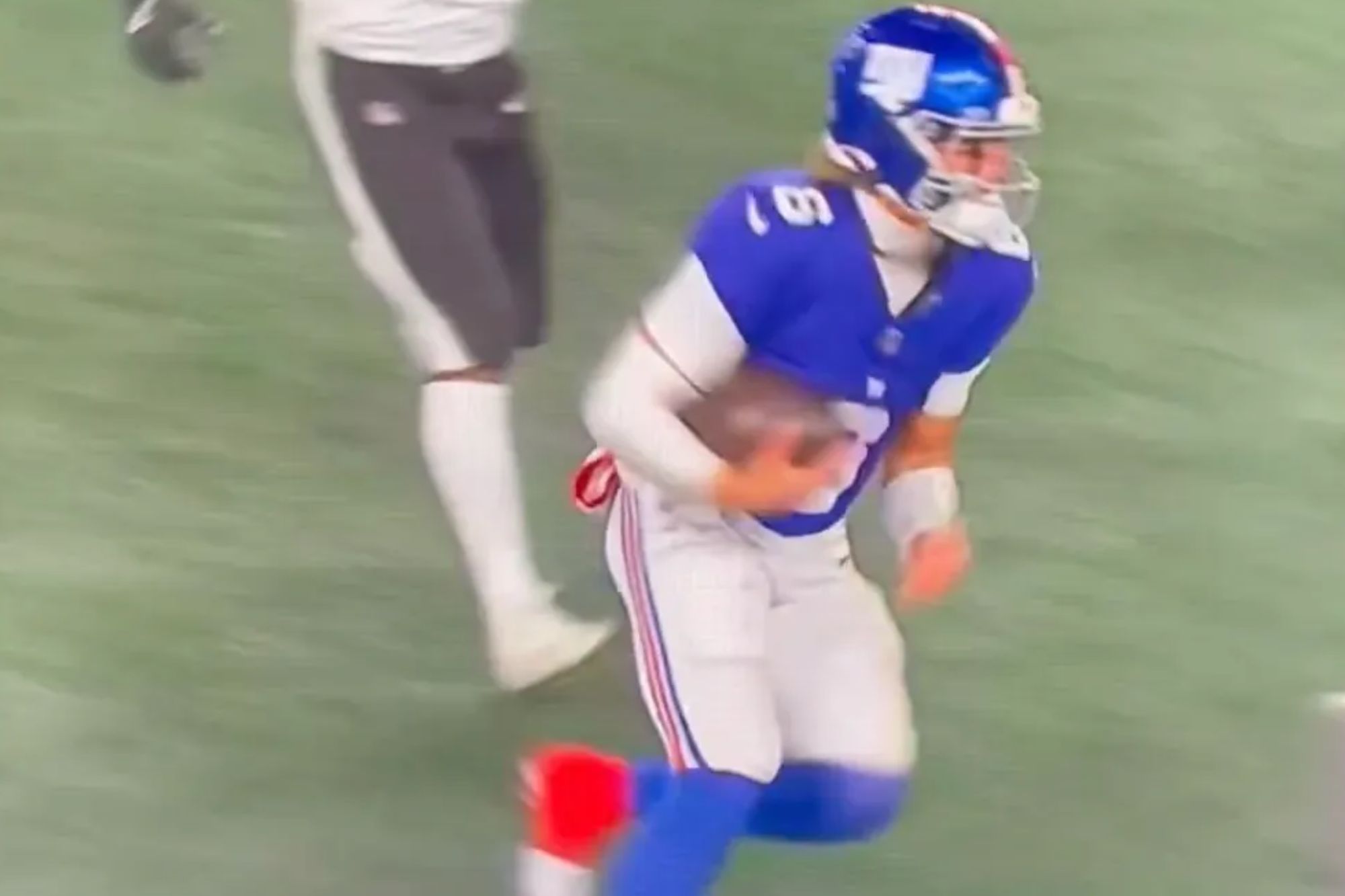 An image collage containing 1 images, Image 1 shows A football player in a blue and white uniform running with the ball, while another player in a white uniform with number 52 runs behind him on a green field