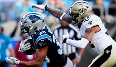 Carolina Panthers running back Chuba Hubbard scores ahead of New Orleans Saints safety Tyrann Mathieu in an NFL football game Sunday, Nov. 3, 2024, in Charlotte, N.C. (AP File Photo/Rusty Jones)