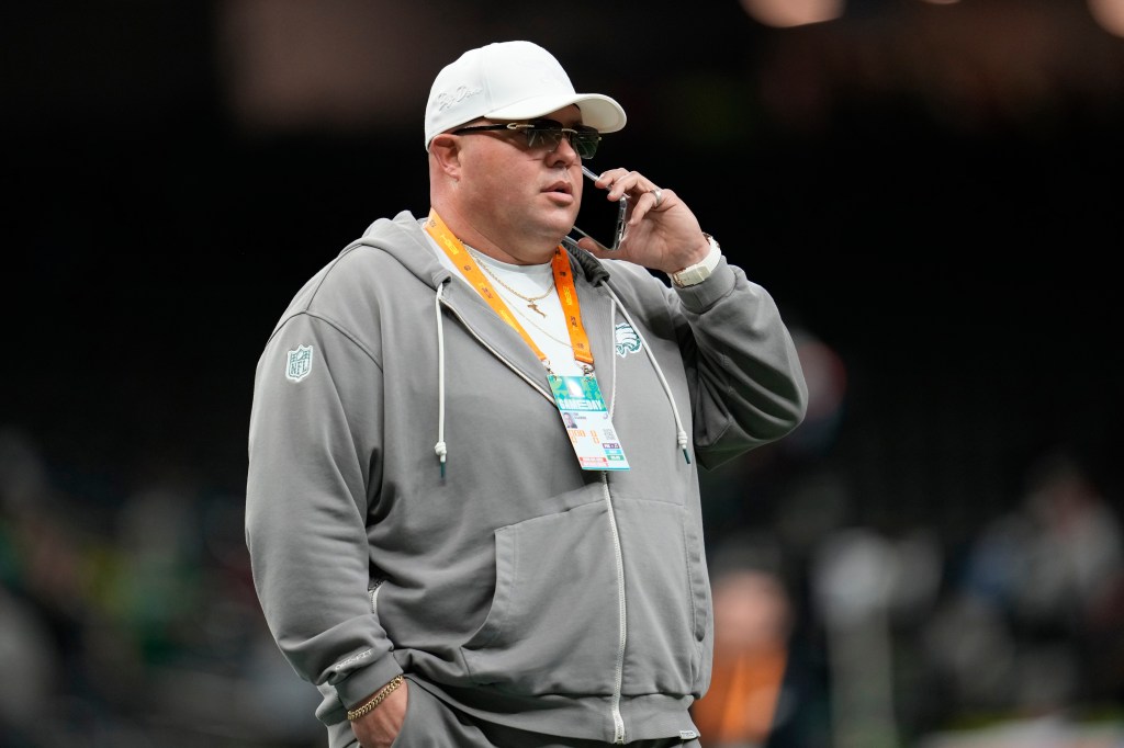 Philadelphia Eagles chief security officer Dom DiSandro speaking on a phone at Super Bowl 59.