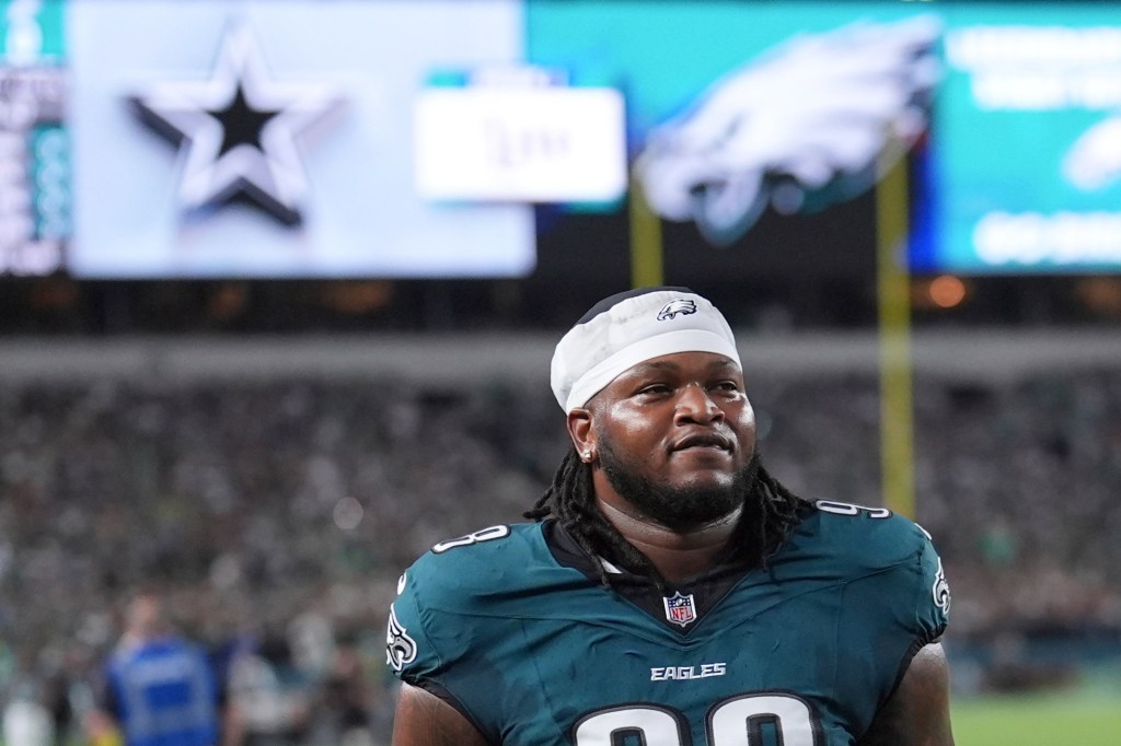 Philadelphia Eagles' Jalen Carter walks off the field after being ejected from a football game against the Dallas Cowboys.
