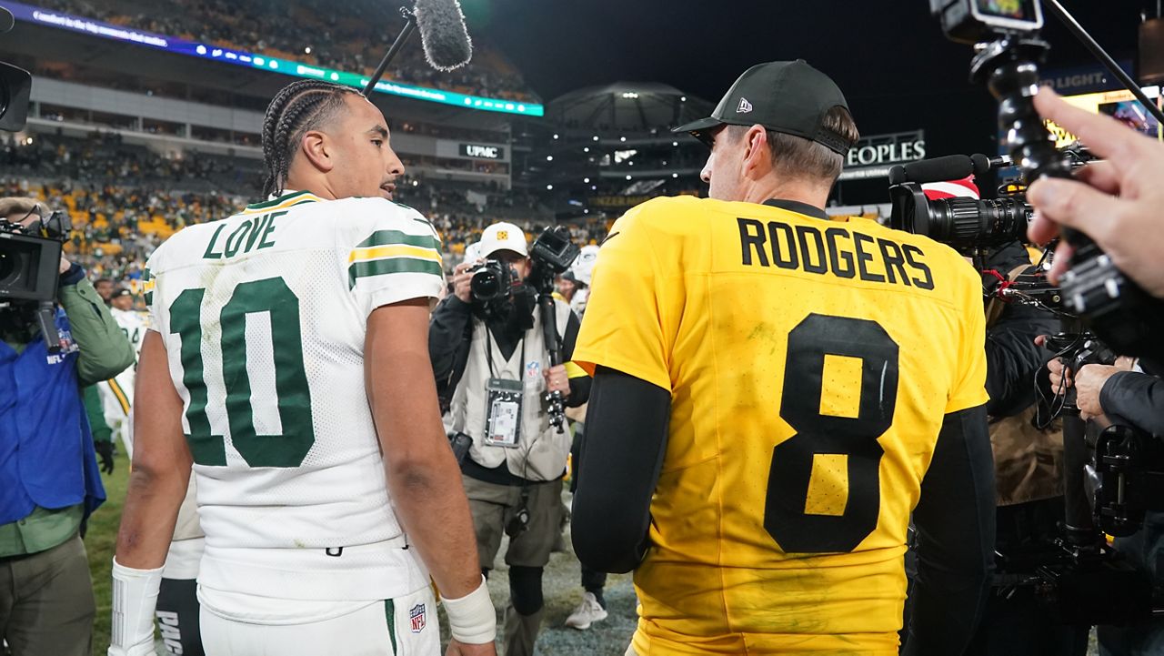 Green Bay Packers' Jordan Love talks to Pittsburgh Steelers' Aaron Rodgers after an NFL football game Sunday, Oct. 26, 2025, in Pittsburgh.