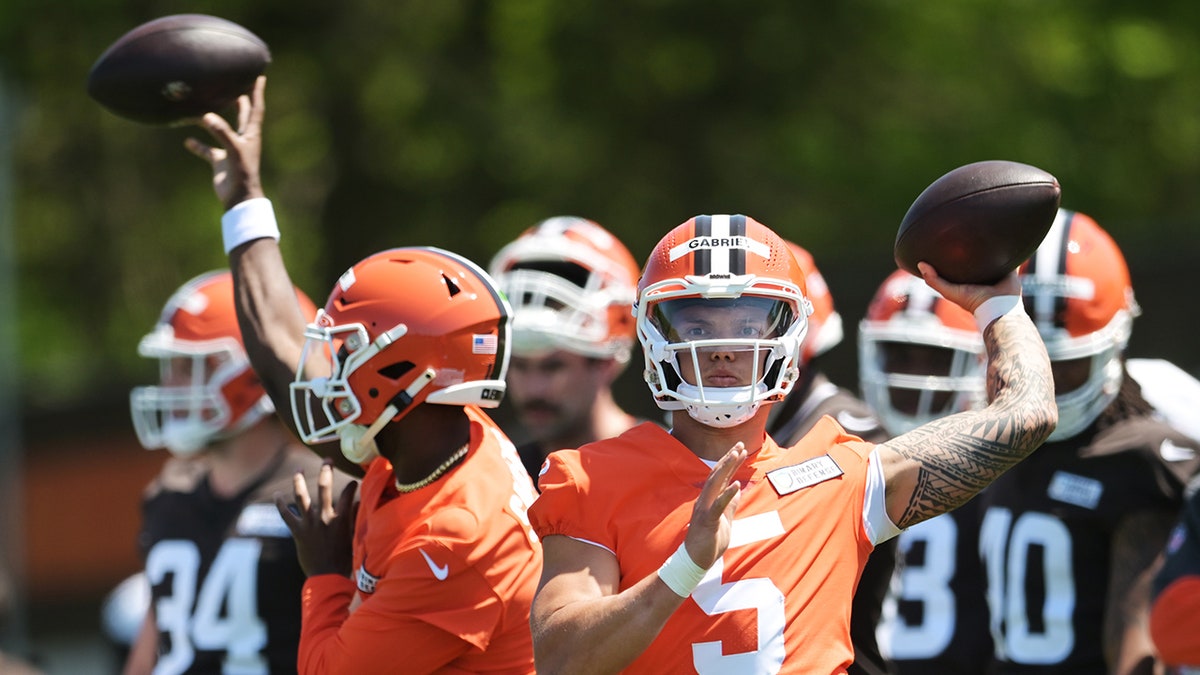 Shedeur Sanders and Dillon Gabriel practicing