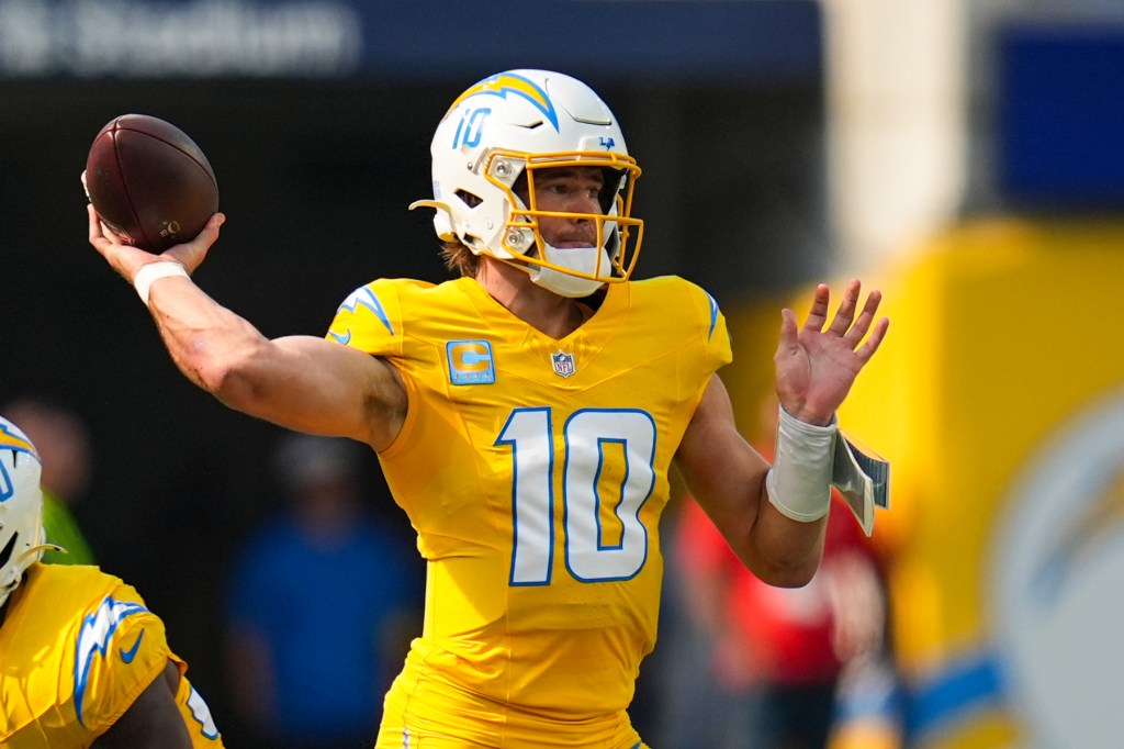 Los Angeles Chargers quarterback Justin Herbert (10) throws a football.