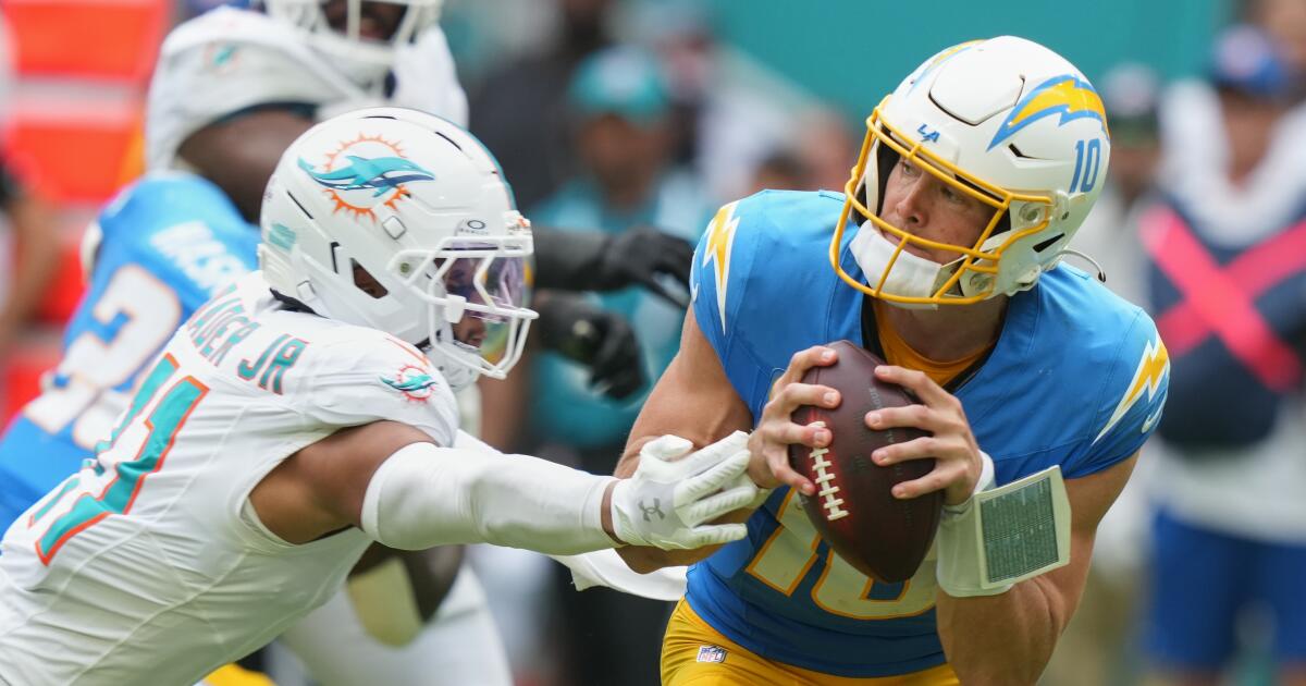 Justin Herbert's miracle escape spurs Chargers to win over Dolphins