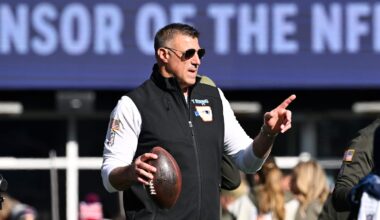 Nov 2, 2025; Foxborough, Massachusetts, USA; New England Patriots head coach Mike Vrabel helps warm the team up before a game against the Atlanta Falcons at Gillette Stadium. Mandatory Credit: Eric Canha-Imagn Images