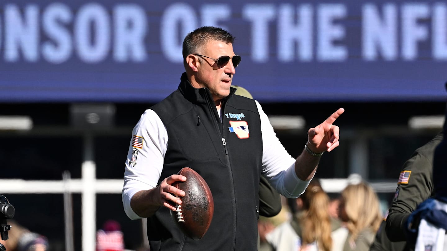 Nov 2, 2025; Foxborough, Massachusetts, USA; New England Patriots head coach Mike Vrabel helps warm the team up before a game against the Atlanta Falcons at Gillette Stadium. Mandatory Credit: Eric Canha-Imagn Images