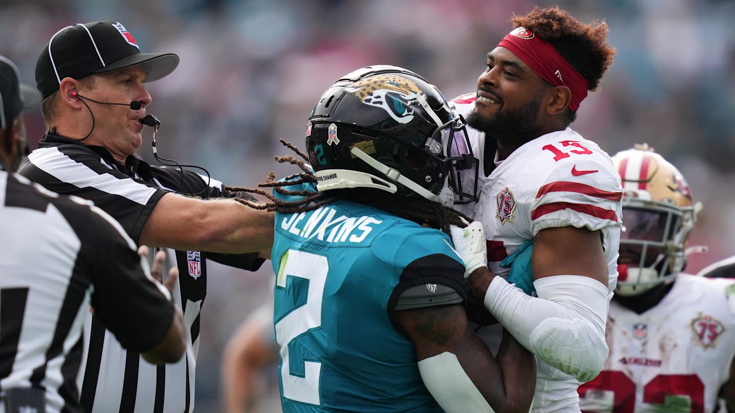 Nov 21, 2021; Jacksonville, Florida, USA; Jacksonville Jaguars free safety Rayshawn Jenkins (2) fights with San Francisco 49ers wide receiver Jauan Jennings (15), Jenkins would be disqualified from the game from a personal foul penalty during the first half at TIAA Bank Field.
