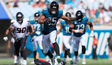 Jacksonville Jaguars tight end Brenton Strange (85) rushes for yards leaping past Houston Texans safety Jalen Pitre (5) during the third quarter of an NFL football matchup at EverBank Stadium, Sunday, Sept. 21, 2025, in Jacksonville, Fla. The Jaguars defeated the Texans 17-10.
