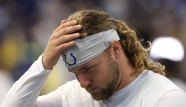Tyler Warren of the Indianapolis Colts holds his head