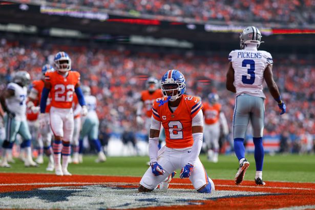 Broncos cornerback Pat Surtain reacts during a game with the Dallas Cowboys
