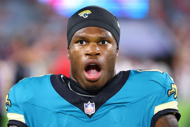 Travis Hunter #12 of the Jacksonville Jaguars reacts on the field prior to playing the Kansas City Chiefs at EverBank Stadium on October 06, 2025 in Jacksonville, Florida