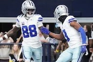 Dallas Cowboys wide receiver George Pickens (3) celebrates with wide receiver CeeDee Lamb...