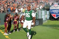New York Jets defensive tackle Quinnen Williams (95) takes the field before an NFL football...