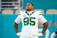 New York Jets defensive lineman Quinnen Williams (95) stands on the field before an NFL...