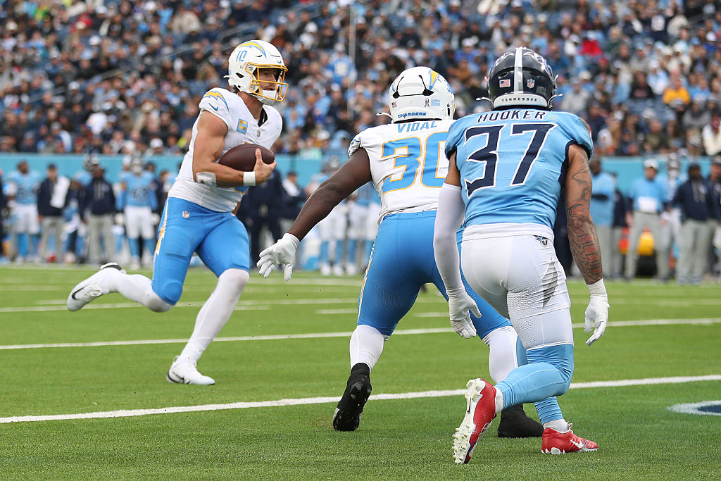 NASHVILLE, TENNESSEE - NOVEMBER 02: Justin Herbert #10 of the Los Angeles Chargers runs for a touchdown during the fourth quarter against the Tennessee Titans in the game at Nissan Stadium on November 02, 2025 in Nashville, Tennessee. (Photo by Justin Ford/Getty Images)
