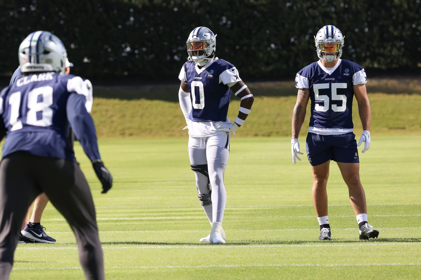 Dallas Cowboys linebacker DeMarvion Overshown (0) and Dallas Cowboys linebacker Logan Wilson...