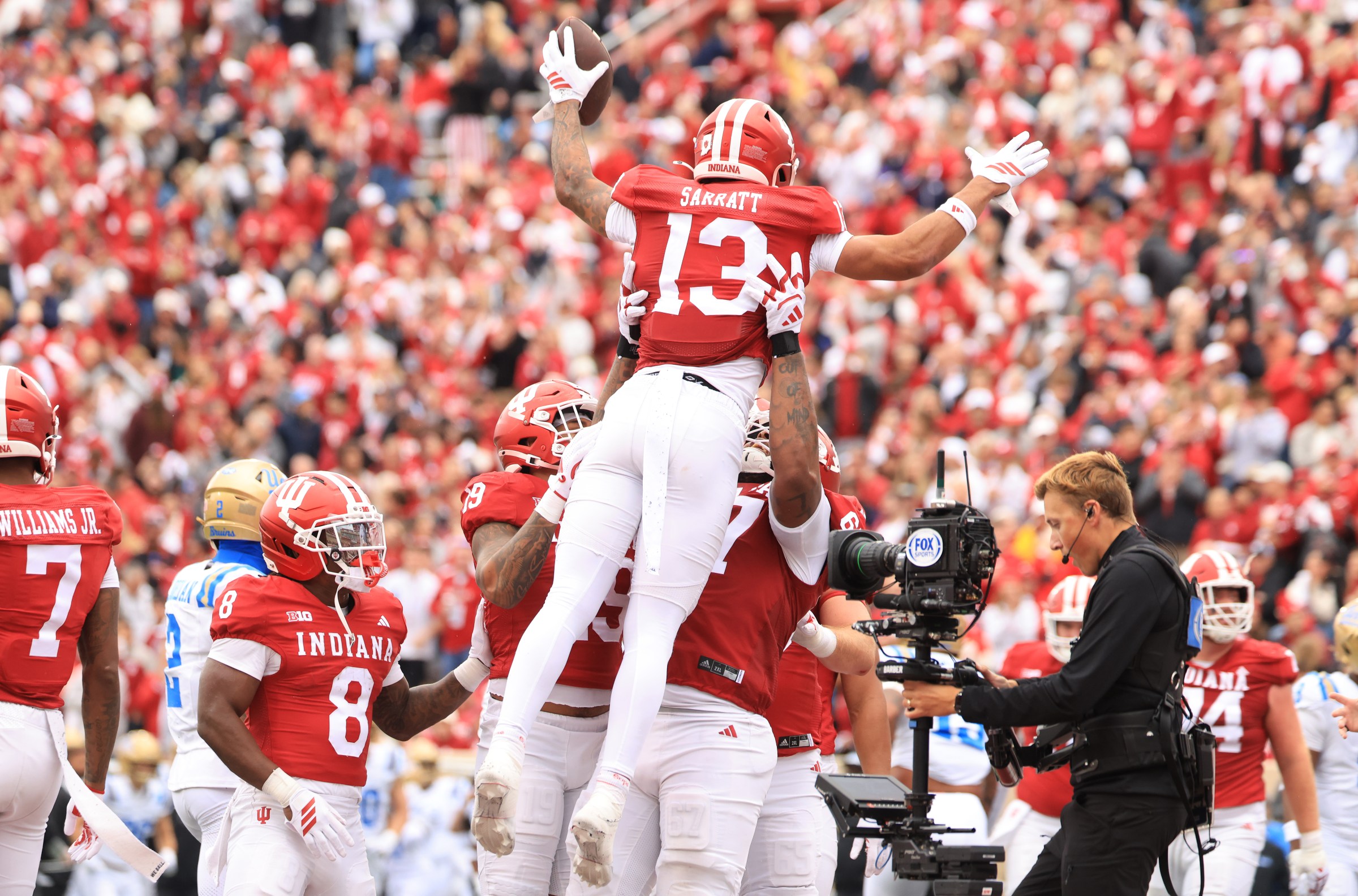 BLOOMINGTON, INDIANA - OCTOBER 25: Elijah Sarratt #13 of the Indiana Hoosiers celebrates a touchdown in the second quarter against the UCLA Bruins at Memorial Stadium on October 25, 2025 in Bloomington, Indiana. (Photo by Justin Casterline/Getty Images)