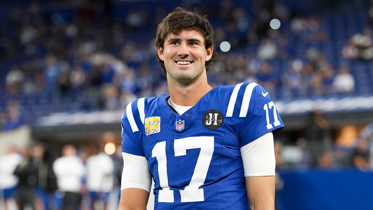 Daniel Jones smiles before game